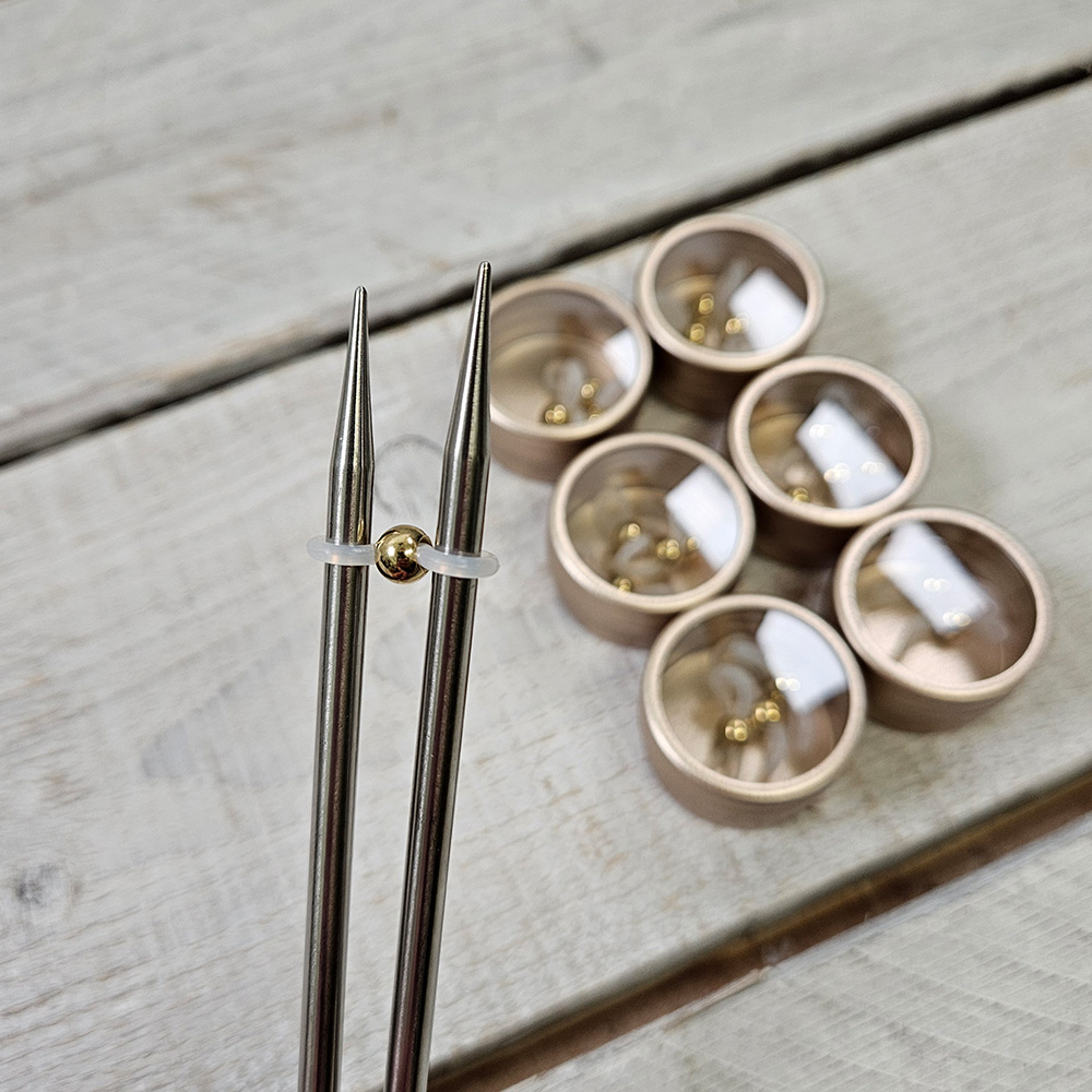 Stopparar á prjóna - faðmarar